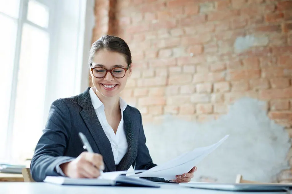 A business owner going through monthly financial statements