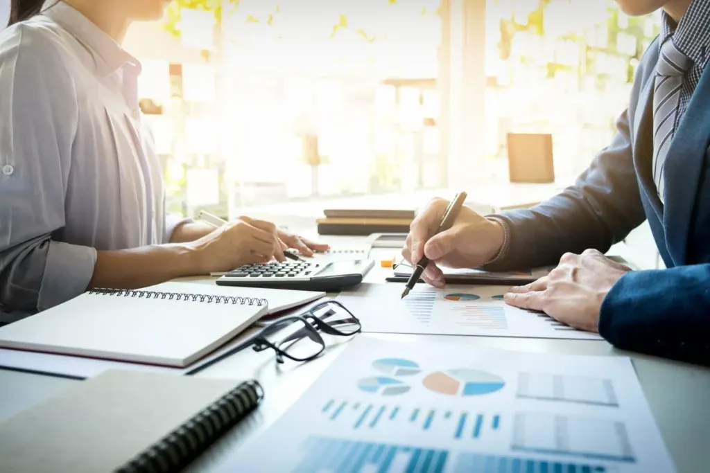 A KWM specialist reconciling accounts during a monthly close
